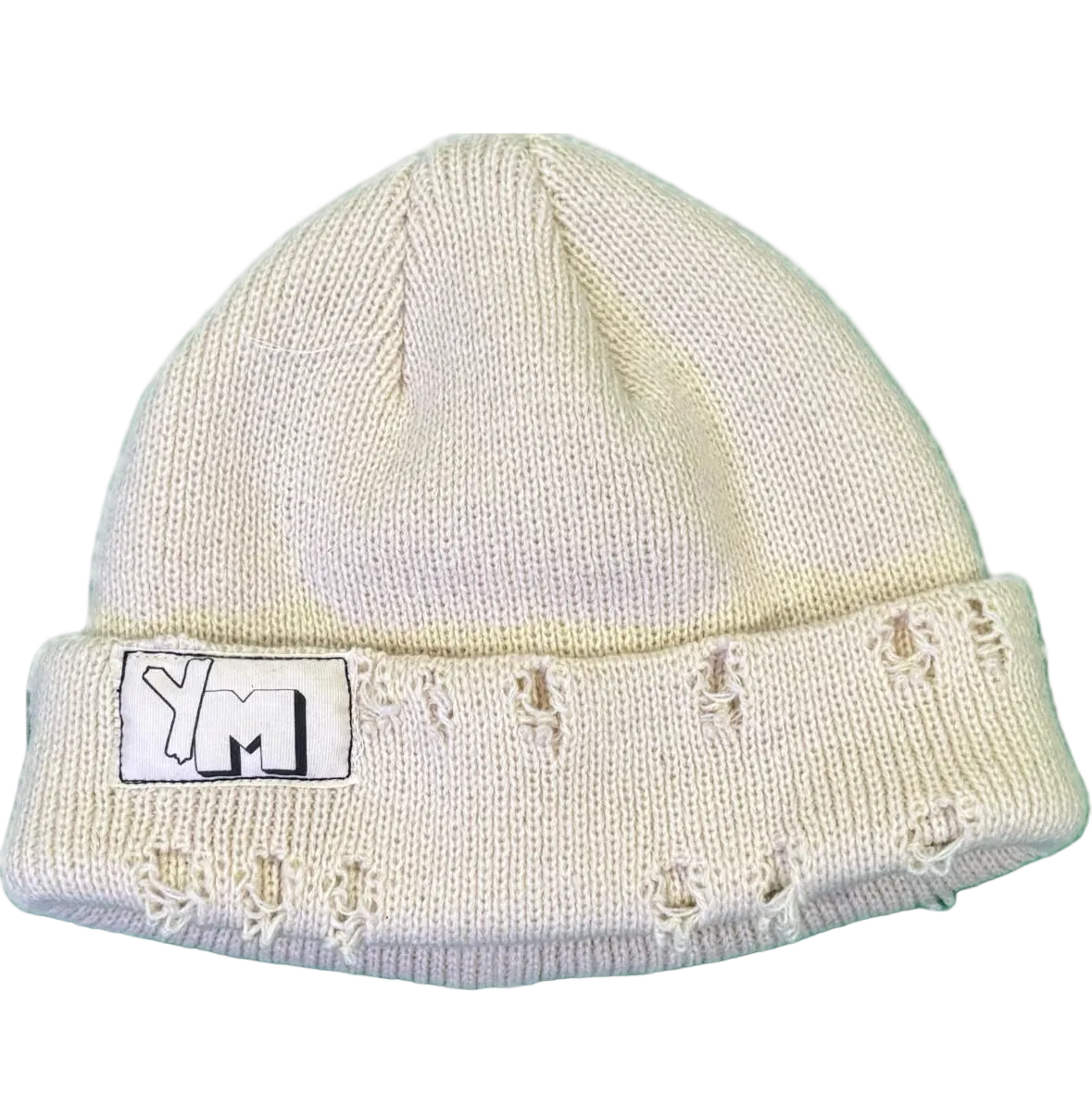 White knit beanie with a logo on a white background