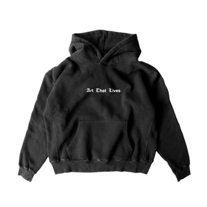 Black oversized hoodie with 'Art That Lives' text on the front.