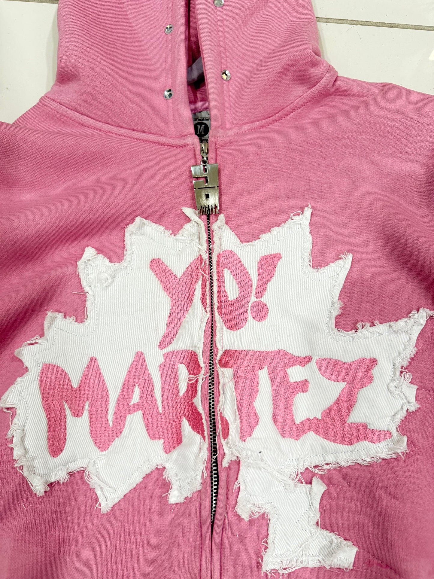Yo! Martez zip-up Hoodie Pink, Close up detail of chest and zipper 