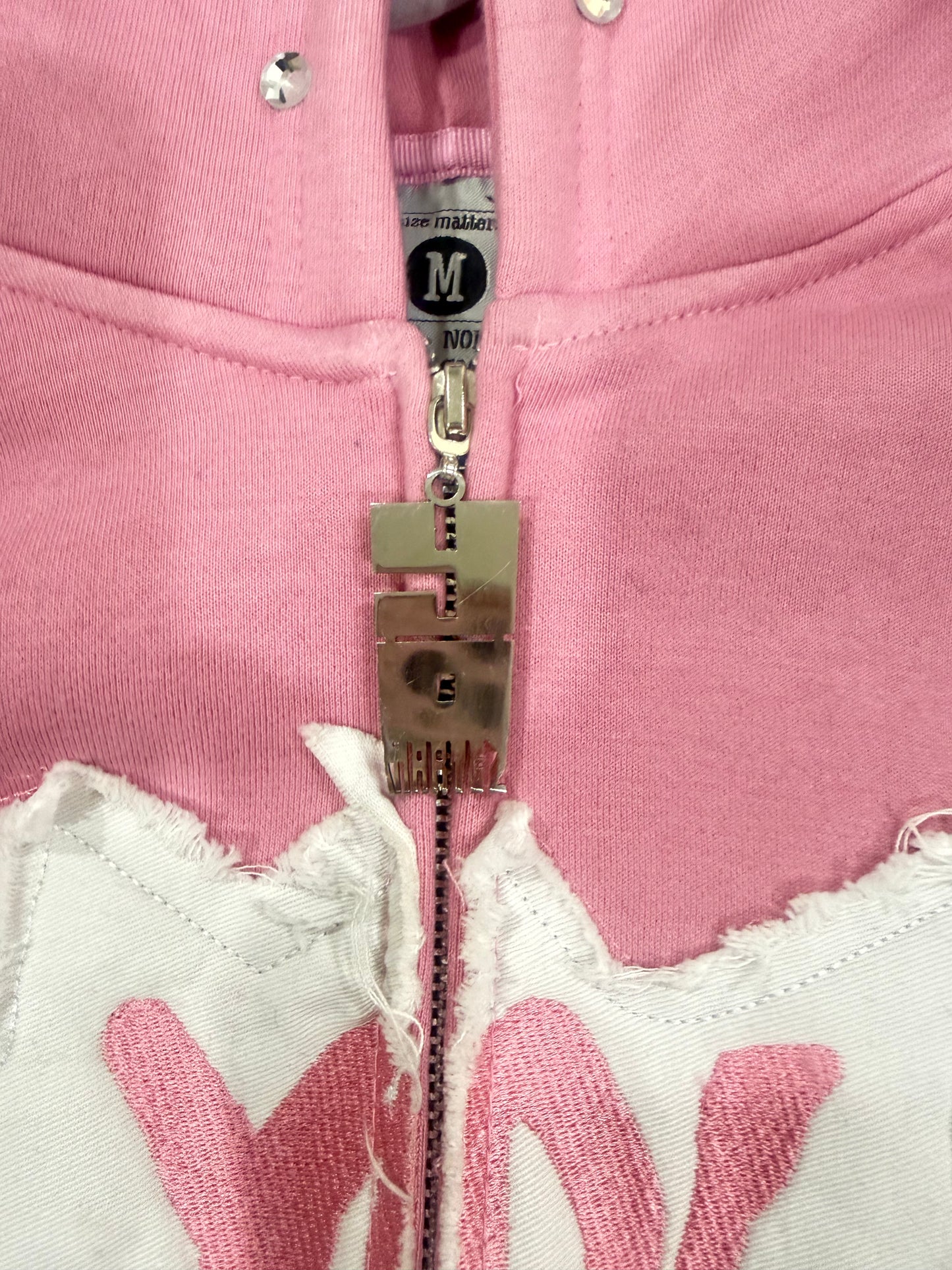 Yo! Martez zip-up hoodie, close up zipper details. 