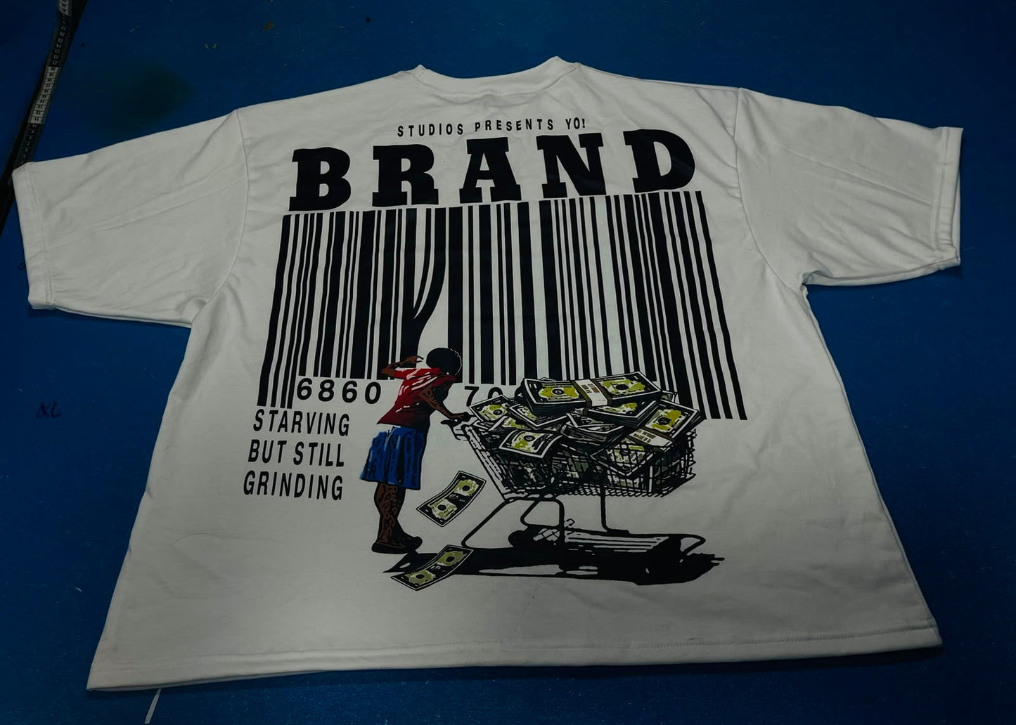 Studio Presents Yo! Brand T-shirt —
Made by Yo! Martez. Close-up