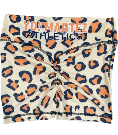 YO! MARTEZ ATHLETICS
Cheetah Girlz — featuring navy blue and orange leopard print pattern, with 'YO! MARTEZ ATHLETICS' printed across the waistband.