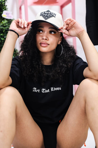 Model styling black embroidered
"Yo! Martez — Quality Goods" hat
