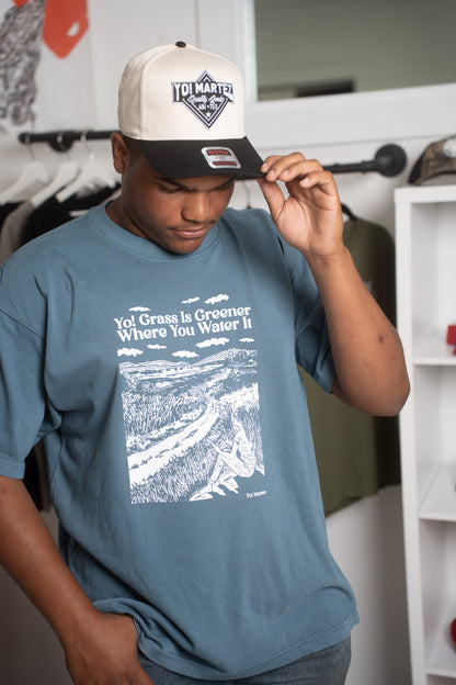 Yo! Martez — Quality Goods 
model stylihg the black hat