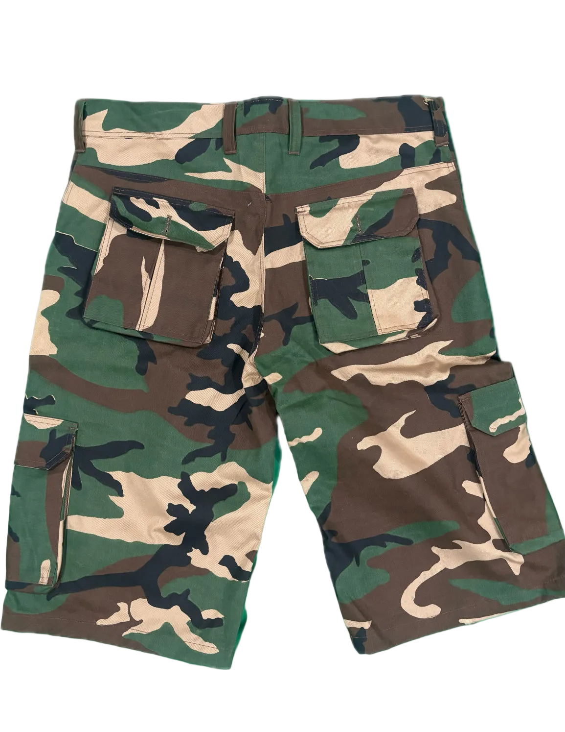 A pair of camouflage cargo shorts with green, brown, and beige woodland camo pattern, featuring multiple utility pockets.