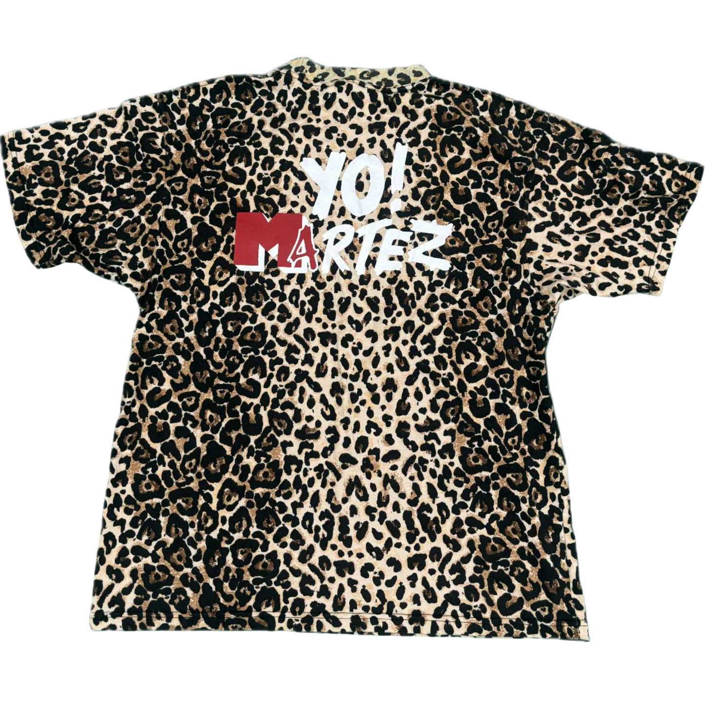 A short-sleeve crewneck t-shirt featuring a classic leopard print pattern in beige, brown, and black, with a red and white 'YO! MARTEZ' graphic printed across the chest.