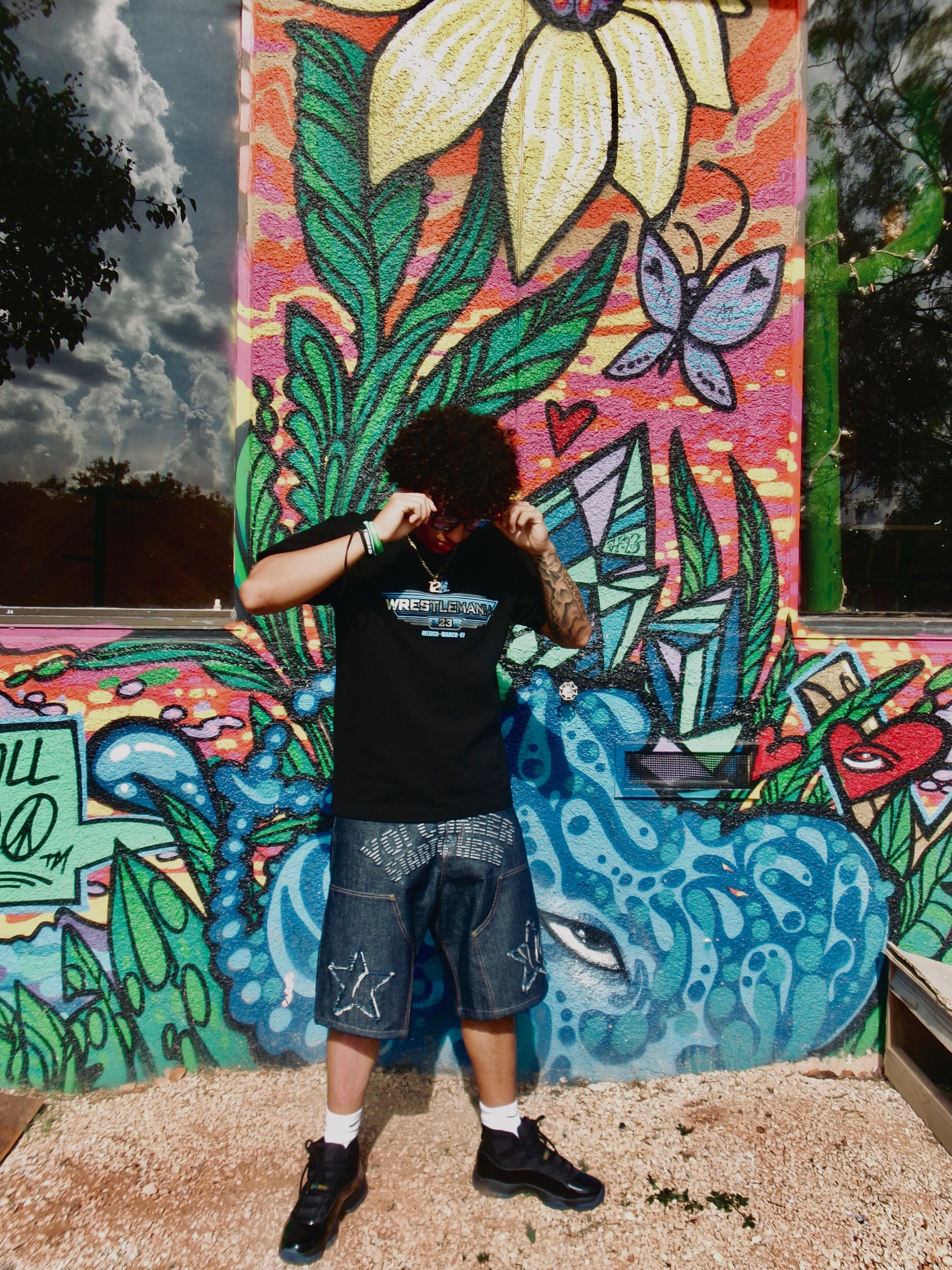 Eric Tonche wearing a SIZE 36 Yo! Martez Denim shorts