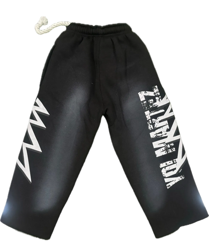 Black pants with white branding on a white background