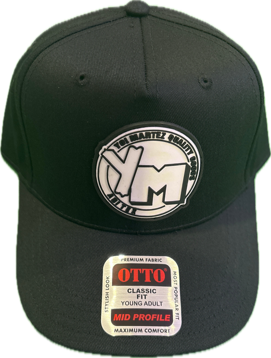 Black cap with a YM logo and 'OTTO' label