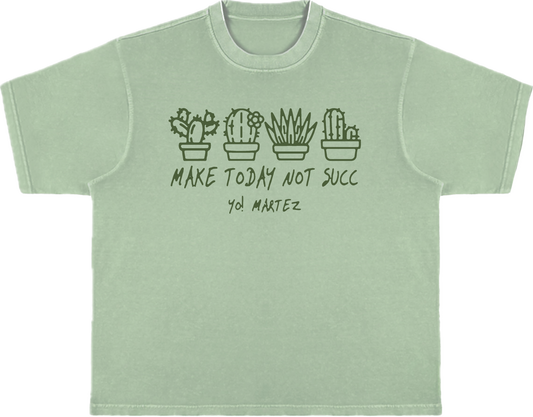A green crewneck t-shirt with text and cactus illustrations on the front.
