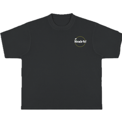 A black crew-neck T-shirt with the text 'Miracle Yo!' on the chest pocket.