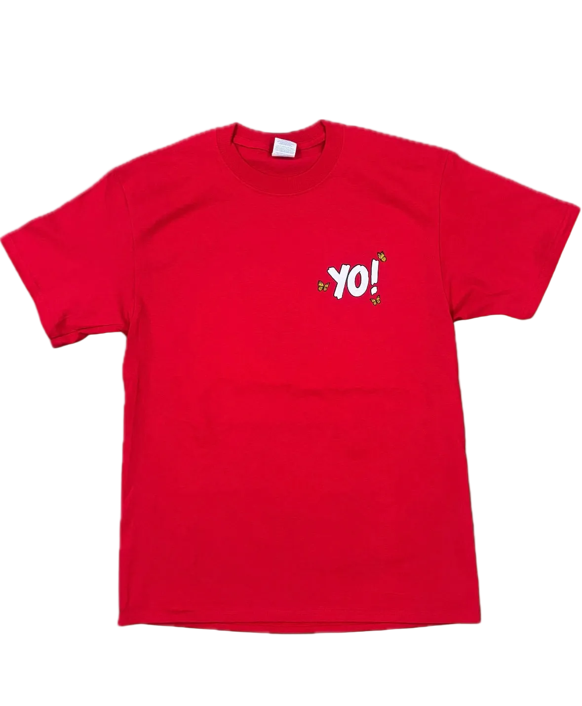 A bright red short-sleeve crewneck t-shirt with a small graphic on the left chest reading 'YO!'. The graphic features white text with a red exclamation mark and small colorful cartoon details.