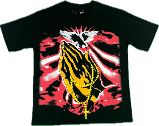 A black t-shirt with a graphic print of praying hands with a blue and white background.