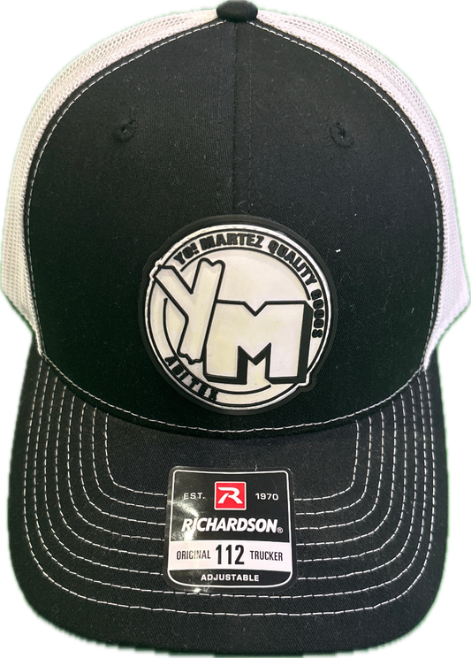 Black and white cap with a YM logo and Richardson label 