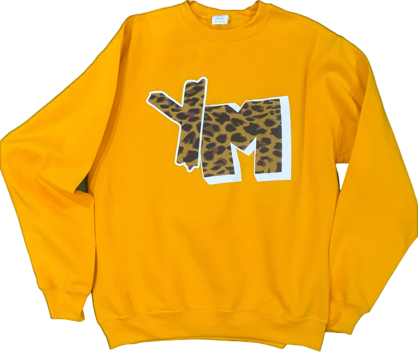 Yellow sweatshirt with leopard print 'YM' design on a black background