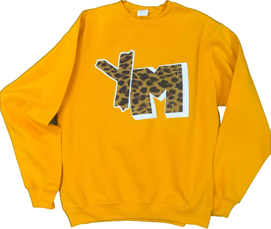 Yellow sweatshirt with leopard print 'YM' design on a black background