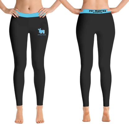 Black leggings with blue waistbands and logos worn by model
