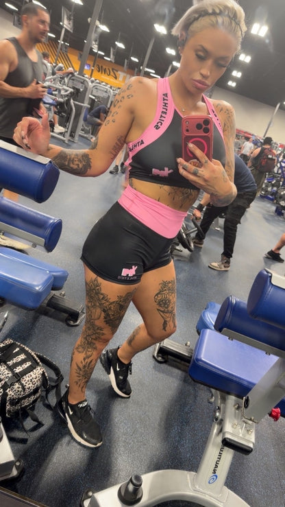 Britney Bolton rocking the pink powerpuff set from Yo! Martez. 